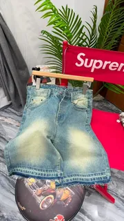 Distressed Light Wash Denim Shorts with Frayed Hem