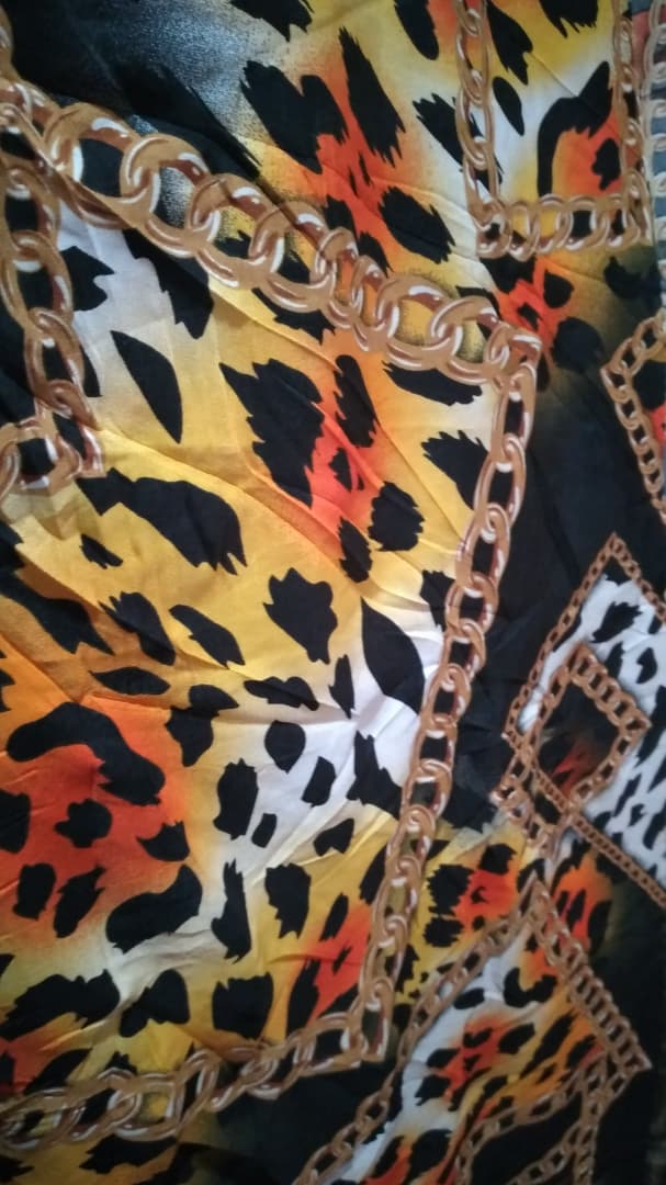 Leopard Print Fabric with Gold Chain Border Design
