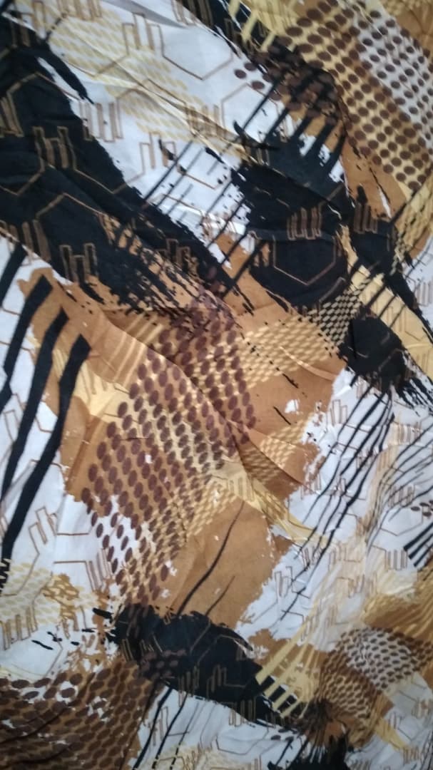 Brown and Black Abstract Print Fabric with Geometric Pattern