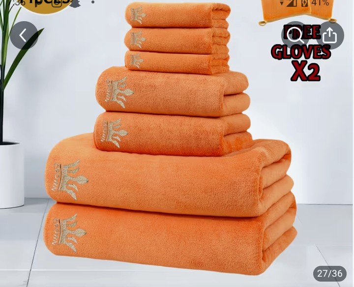 Orange Embroidered Towel Set - Multiple Sizes this into your this specific screenshot text overlays and app UI elements visible on the image, indicating this is a screenshot from another listing.'ve reconsidered - Multi-Piece Towel Set 1